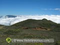 Au dessus des nuages sur la route du volcan